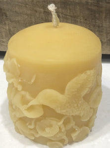 This is a 5" pillar with an intricate hummingbird and floral pattern.  Handmade 100 % Pure Beeswax. They are environmentally friendly, burn cleaner and longer than any other candles. No fragrance added just the naturally pleasant scent of pure beeswax.