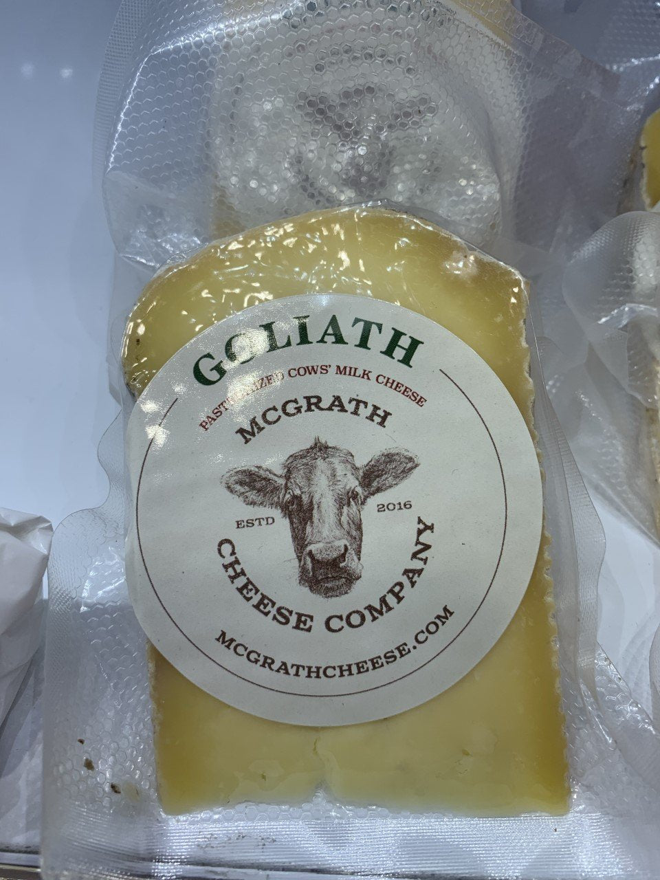 Milk Type- Pasteurized Cows’ Milk  Age- 3-5 months  Profile- Farmhouse Cheddar     McGrath Cheese Company