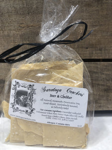 Saratoga crackers will Keep your cheese platters top notch, your parties one-upping, and your healthy snacking on point! Cheese cracker varieties include: Saratoga spice and parmesan, garlic parmesan, cracked pepper and parmesan, beer and cheddar, olive, and hot pepper cheddar. Each package is 3.5 oz., contained in a cellophane to retain freshness, sealed with a black tie.