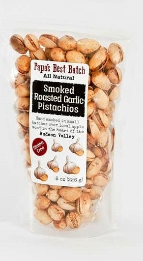 Roasted Garlic Smoked Pistachios are marinated in lots of fresh garlic, cider vinegar and just a touch of sea salt. Then they spend six hours in the smoker, roasting the pistachios and garlic to deliciousness Gluten Free, Non GMO, All Natural.  8 oz