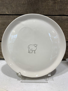 Handcrafted in upstate New York, this porcelain dinner plate’s softly sculpted edge gives it an organic shape, while its size is ideal for everyday meals. Durable and designed to withstand wear, it’s dishwasher safe and microwavable. All glazes are certified food safe and lead free, meeting the requirements of Proposition 65, the highest standard for ceramic glazes. 