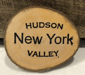 Take a piece of the Hudson Valley home with you or give as a gift.  Made of fruitwood from a local orchard and ink stamped.  Magnetic strip on back.    Sizes vary, approximately 3" x 4" x 1/4" thick
