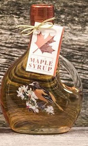 Beautiful basquaised printed glass bottle of maple syrup.  Designs include bluebird, cardinal and oriole.  250mL glass bottle